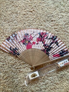 Source Unknown Pink and Tan Folding Fan with Samurai Design